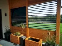 Article thumbnail: La véranda abritée du vent de Monique et Daniel