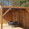 Creation of a privacy screen on a bioclimatic pergola with SUNDIY XL mechanisms in sand beige color and Douglas wood blades